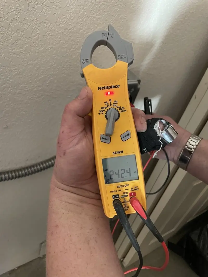 Voltage testing with clamp meter during Ceiling Fan Installation in Union City